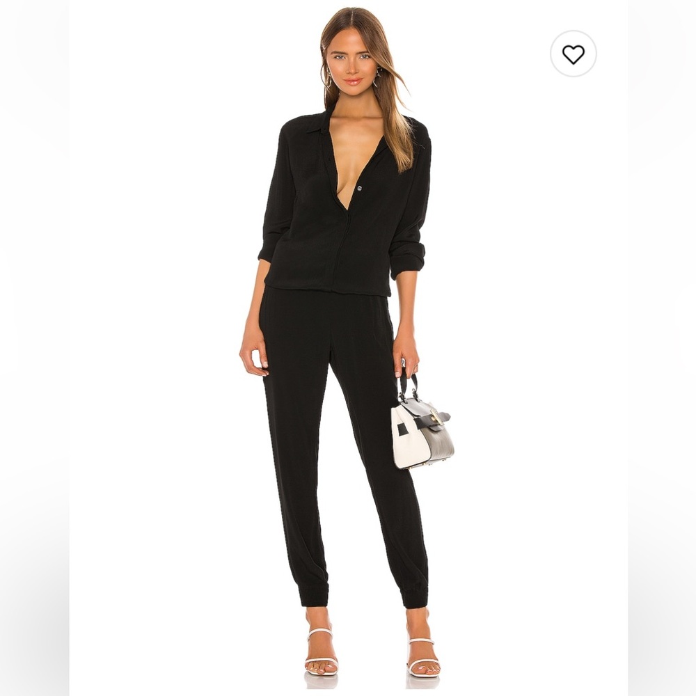Only worn once! Adorable fitting jumpsuit!